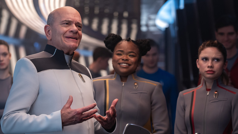 The Doctor talking to someone next to Sam and Genesis on Star Trek: Starfleet Academy