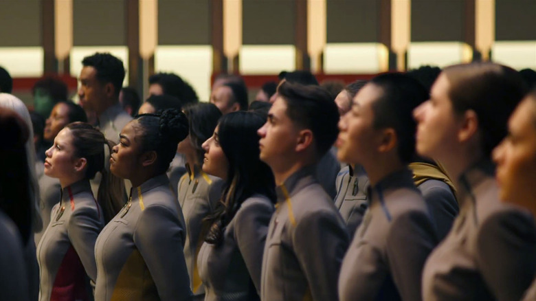 The cadets in Starfleet Academy stand at attention in their matching grey uniforms in "Star Trek: Starfleet Academy"