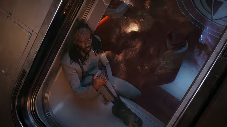 Star Trek: Starfleet Academy - Jay-Den staring out observation window at nebula