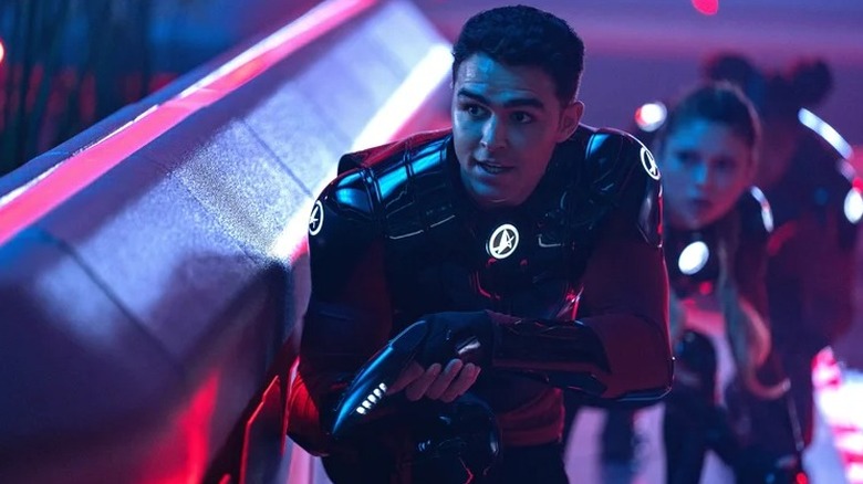 Darem Ryan holding phaser in Star Trek: Starfleet Academy