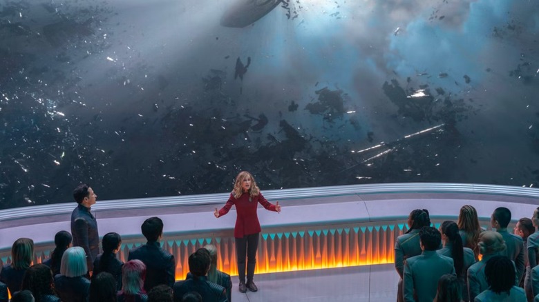 Star Trek: Starfleet Academy - Nahla Ake giving talk in front of space debris