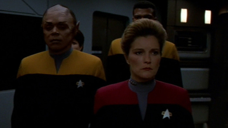 Janway and two decurity guards walking Tuvix to his death on Star Trek: Voyager