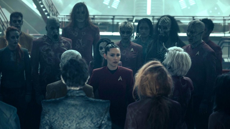 La'an surrounded by zombie ghosts on Star Trek: Strange New Worlds