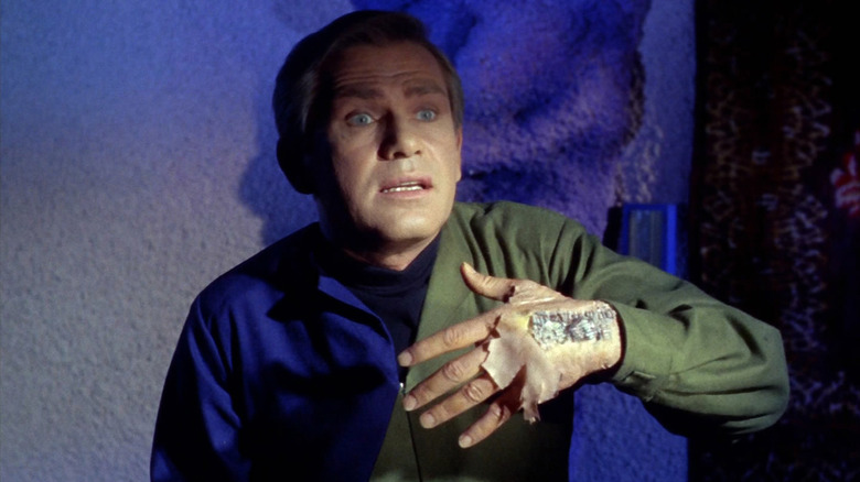 Star Trek: The Original Series, "What Little Girls Are Made Of," Roger Korby with android hand exposed