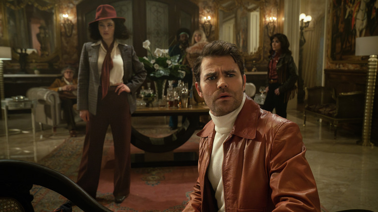 Christina Chong as La'an and Paul Wesley as Kirk dressed in period clothing in Star Trek: Strange New Worlds