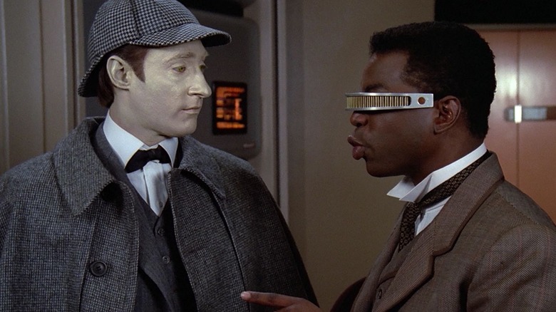 Data as Sherlock Holmes and Geordi as Dr. Watson on Star Trek: The Next Generation