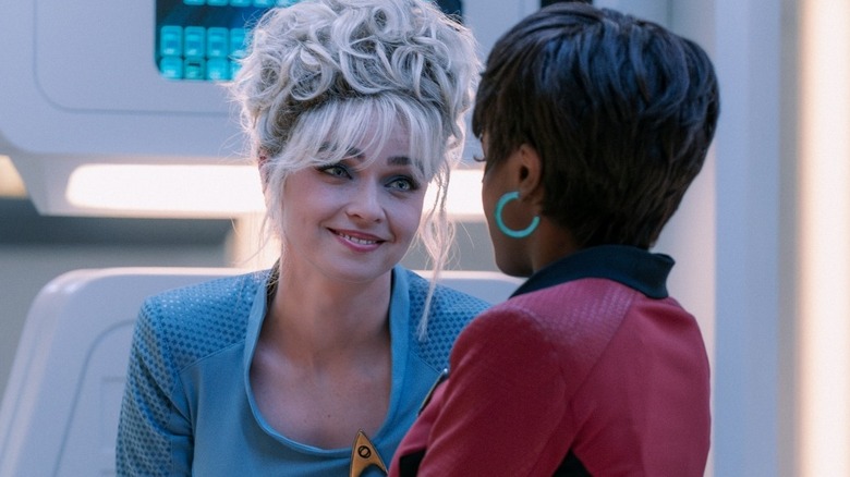 Nurse Chapel smiling at Uhura on Star Trek: Strange New Worlds