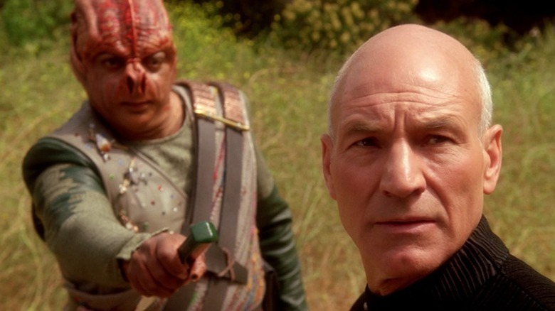 Dathon (Paul Winfield) offers Jean-Luc Picard (Patrick Stewart) a dagger in Star Trek: The Next Generation