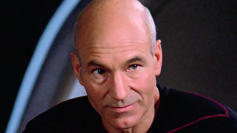 Picard smirks at the camera