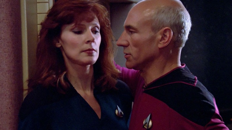 Picard leaning in close to Dr. Crusher on Star Trek: The Next Generation