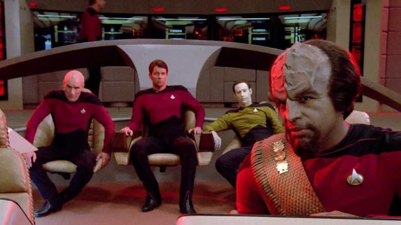 Worf at the helm with Picard, Riker, and Data behind him on Star Trek: The Next Generation