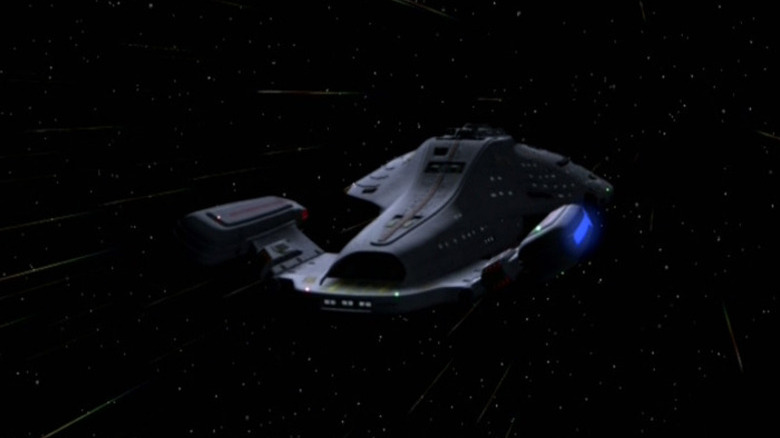 The USS Voyager sailing away on Star Trek: Voyager
