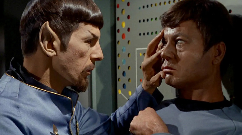 Mirror Universe Spock performing a mind-meld on Dr. McCoy on an episode of Star Trek