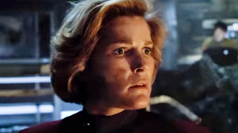 Kathryn Janeway (Kate Mulgrew) stares in shock in Star Trek: Voyager