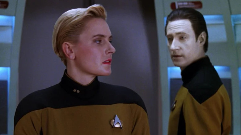 Tasha Yar (Denise Crosby) glances back at Data (Brent Spiner) in Star Trek: The Next Generation