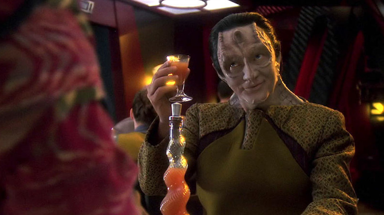 Garak raising a glass on Star Trek: Deep Space Nine