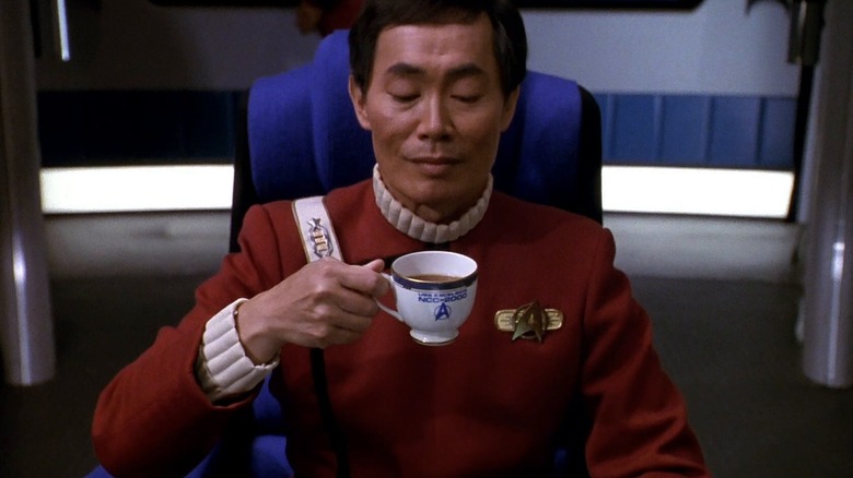 Captain Sulu on the bridge of the Excelsir drinking tea in Star Trek VI: The Undiscovered Country