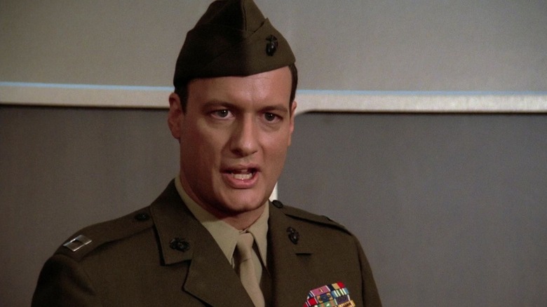 Q, dressed as a WWII soldier, on the bridge of the Enterprise-D.