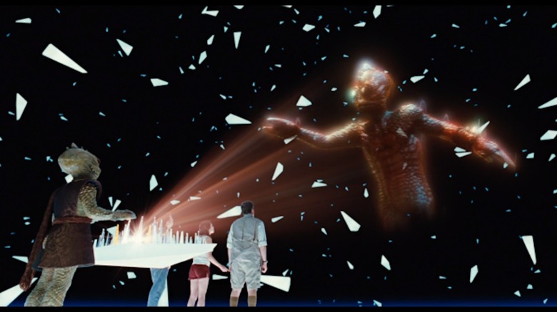 Leonard Nimoy as the Zarn destroys the tachyon amplifier as Will Ferrel as Dr. Rick Marshall and Anna Friel as Holly Cantrell watch in Land of the Lost