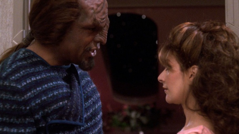 Worf and Troi about to kiss on Star Trek: The Next Generation
