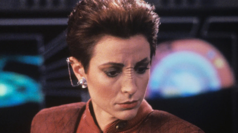Major Kira looking pensive on Star Trek: Deep Space Nine