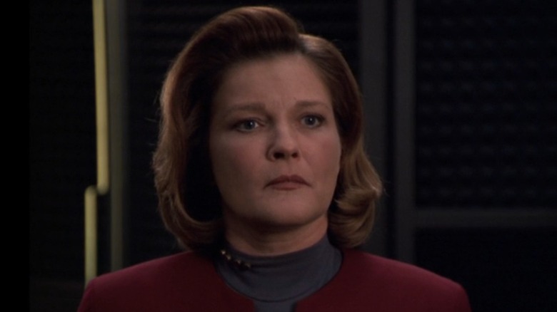 Kate Mulgrew as Captain Janeway, looking serious