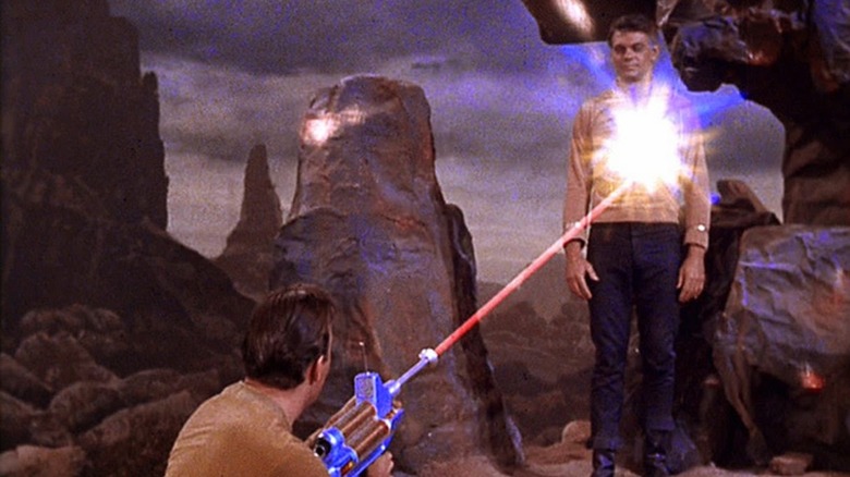 Gary Mitchell being shot by a phaser on Star Trek