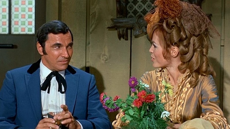 Mark Lenard as Aaron Stempel shares a drink with Diahn Williams as Patrica Vanderhoff in Here Come the Brides
