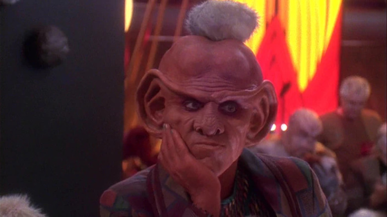 Armin Shimerman as Quark on Star Trek: Deep Space Nine with a tribble on his head