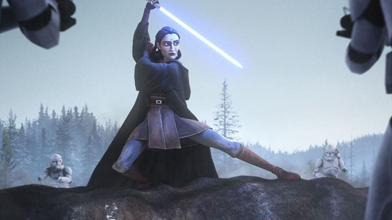 Depa Billaba (Archie Panjabi) holds her blue lightsaber while surrounded by Clone Troopers in Star Wars Rebels