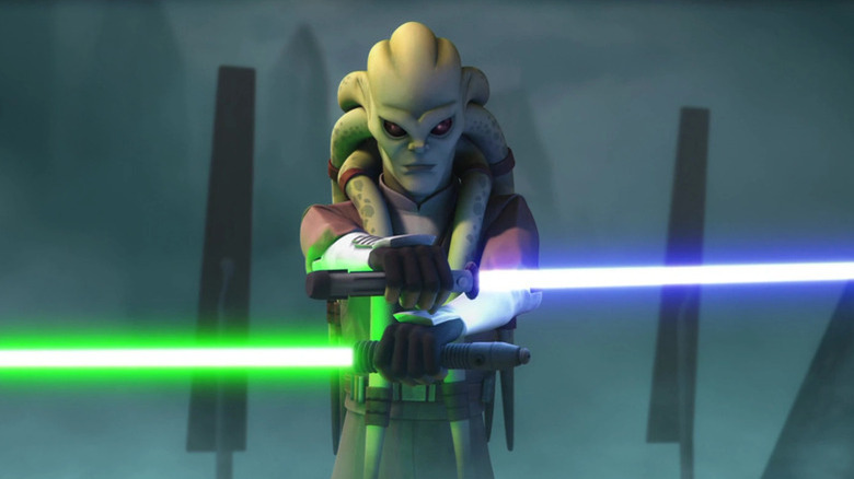 Kit Fisto (Phil LaMarr) holds blue and green lightsabers in Star Wars: The Clone Wars