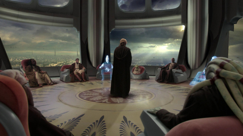 An adult Anakin Skywalker (Hayden Christensen) stands surrounded by the High Jedi Council in Star Wars: Episode III - Revenge of the Sith