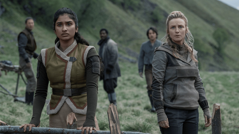 Vel and cinta with hest crew on Aldhani in Andor Season 1