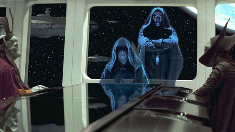Member of the Trade Federation meet with Darth Sidious and Maul (via hologram) in Star Wars: The Phantom Menace