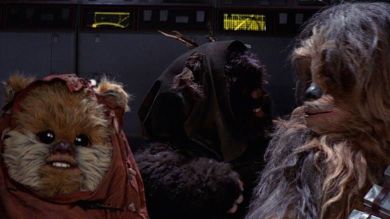 Ewoks in the cockpit of an AT-ST with Chewbacca in Star Wars: Return of the Jedi
