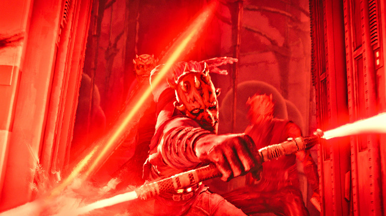 Maul wielding his lightsaber and looking incredibly cool as he swings it in Star Wars: Maul – Shadow Lord