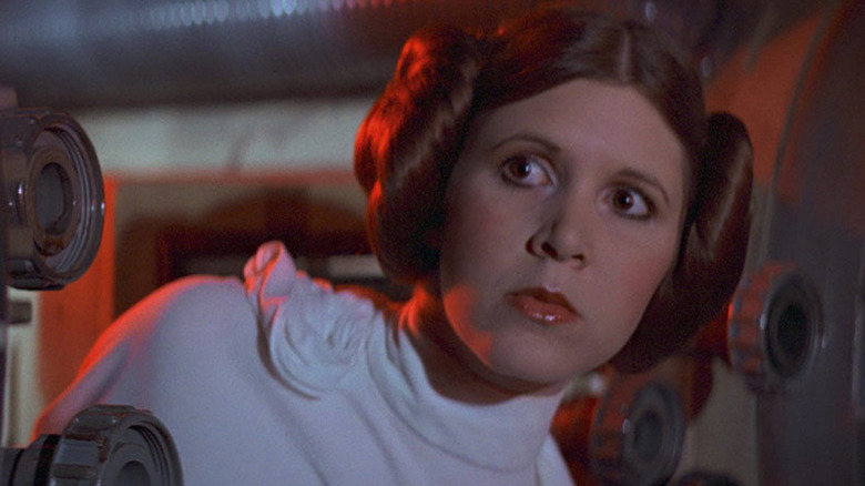 Carrie Fisher as Leia looking wary in Star Wars: A New Hope