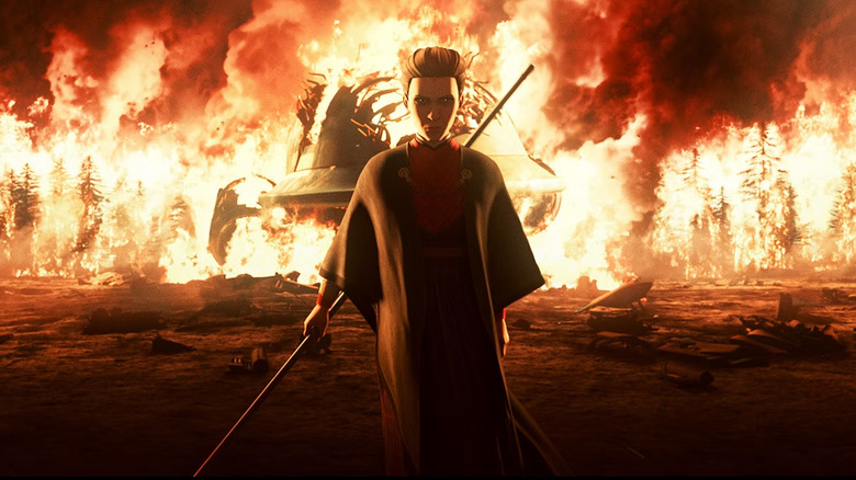 Morgan Elsbeth standing in a fire burning the forests of Corvus