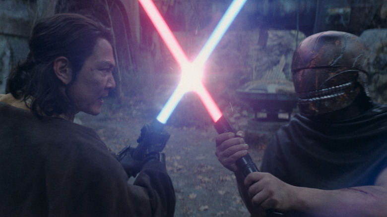 Master Sol facing off against the Stranger in a lightsaber duel in Star Wars: The Acolyte