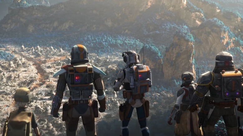 The Bad Batch's Tech, Hunter, Omega, and Echo looking at a battered landscape
