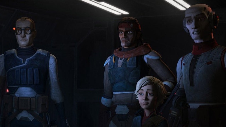 The Bad Batch's Tech, Hunter, Omega, and Echo looking at a holo