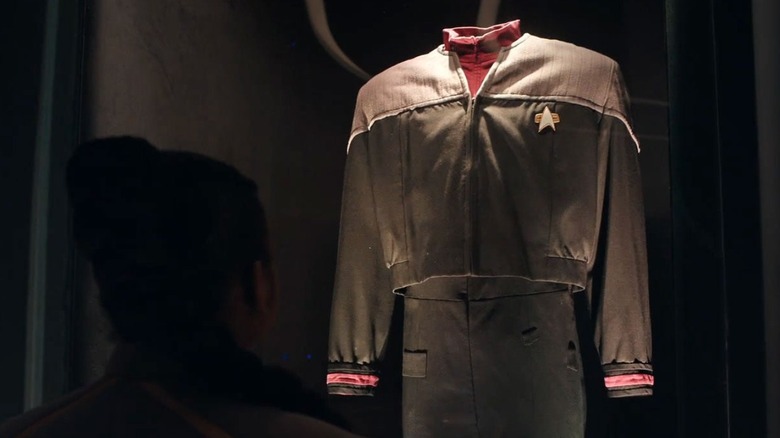 Star Trek: Starfleet Academy - SAM looking at Ben Sisko's Starfleet uniform in museum exhibit