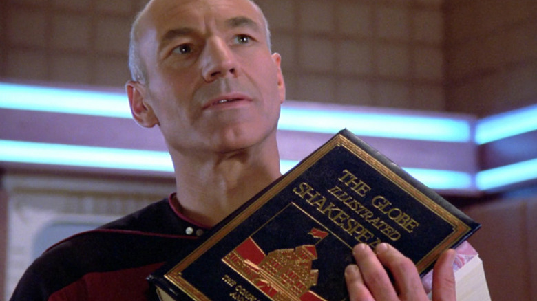 Picard holding a book collection of William Shakespeare plays in Star Trek: The Next Generation