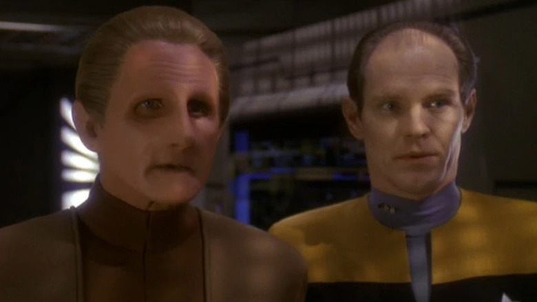 René Auberjonois as Odo standing next to Ken Marshall as Michael Eddington in Star Trek: Deep Space 9