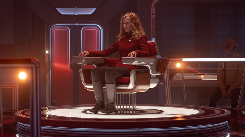 Holly Hunter as Chancellor Nahla Ake sitting in a captain's chair in Star Trek: Starfleet Academy