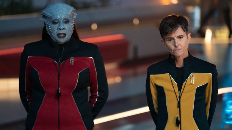 Lura Thok and Jett Reno in coaching uniforms on Star Trek: Starfleet Academy