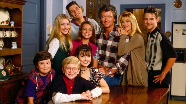 The cast of Step by Step, posed for a portrait on the set of the series