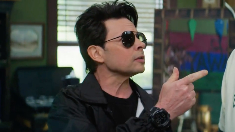 Jason Marsden as Bog, wearing shades and pointing a finger in A Week Away: The Series