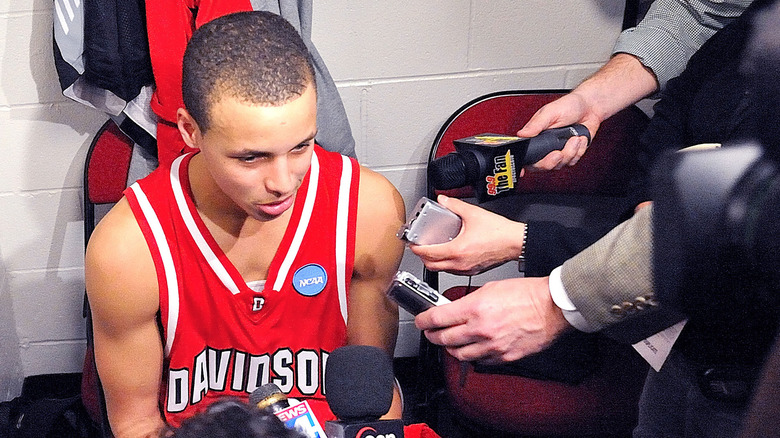 Steph Curry in a locker room