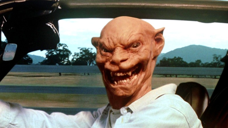 Charles Brady turning into a cat monster in Sleepwalkers